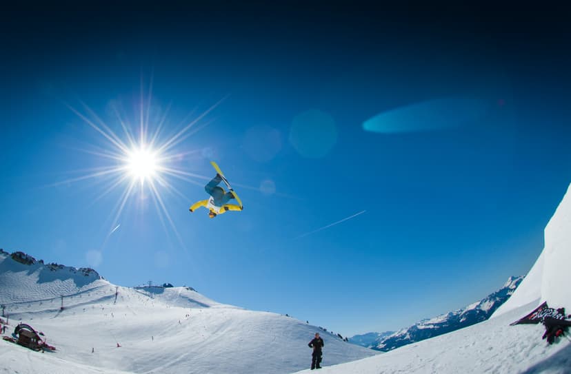 Snowboarder in mid-air doing a flip