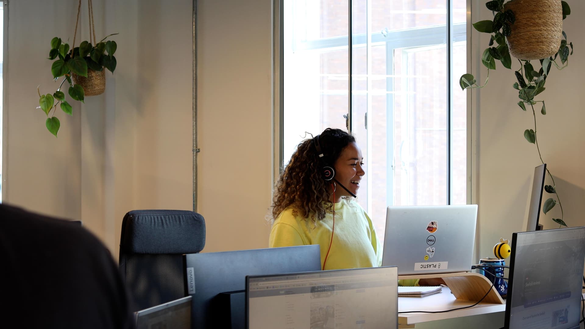 Woman helps customers on the phone