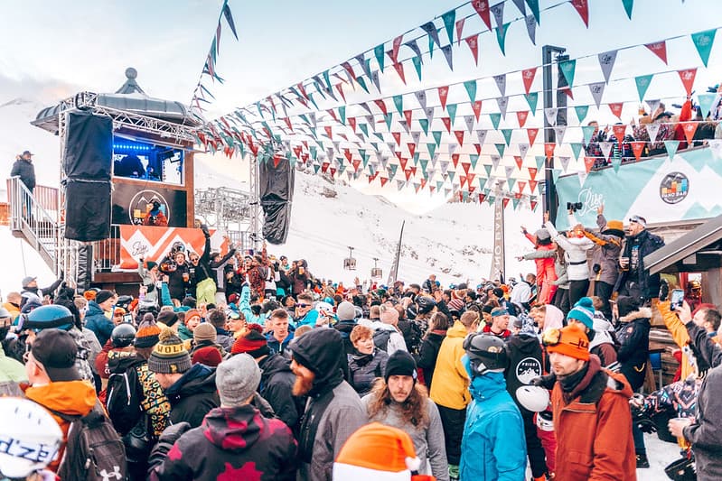Skiiers enjoying Apres ski bar in Les Deux Alpes French Ski Resort